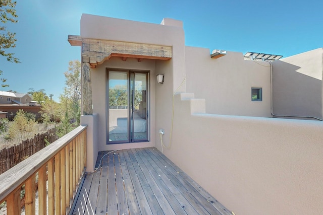 property entrance with a balcony