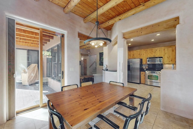 dining room with beamed ceiling, light tile patterned floors, wooden ceiling, and a notable chandelier