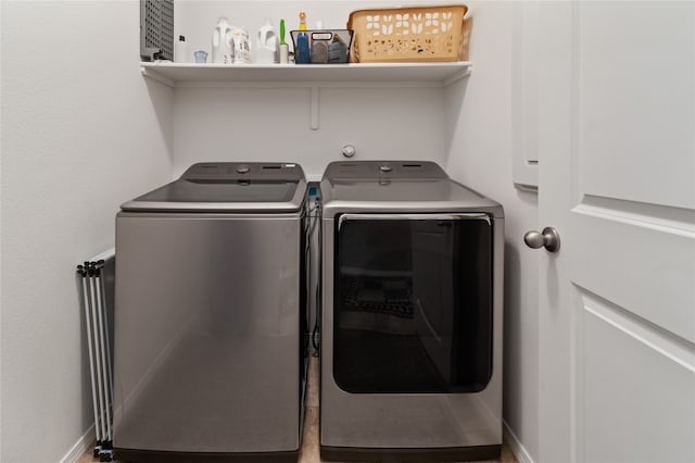 laundry area featuring washing machine and dryer