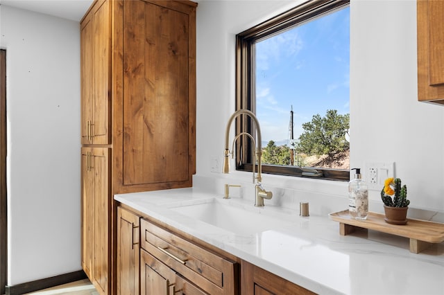 bathroom with vanity and a wealth of natural light