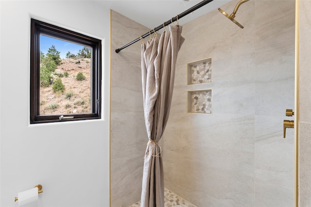 bathroom with curtained shower