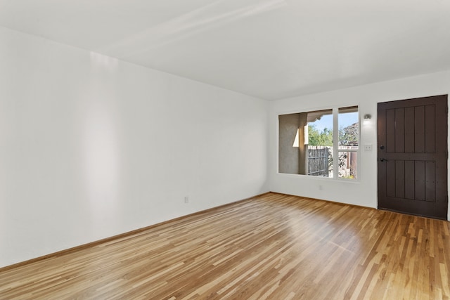 empty room featuring light hardwood / wood-style floors