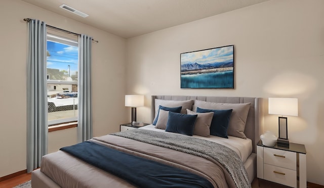 bedroom with wood-type flooring