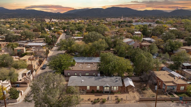 aerial view at dusk with a mountain view