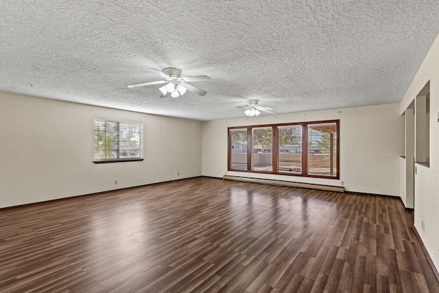 unfurnished room featuring dark hardwood / wood-style floors, ceiling fan, a textured ceiling, and a baseboard heating unit