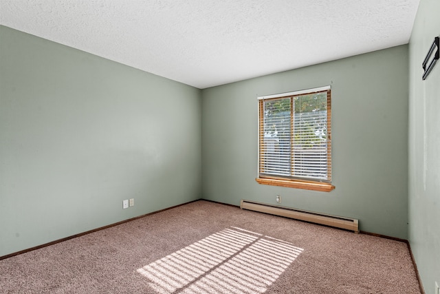 empty room with a textured ceiling, light carpet, and a baseboard radiator