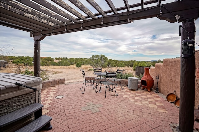 view of patio featuring a pergola