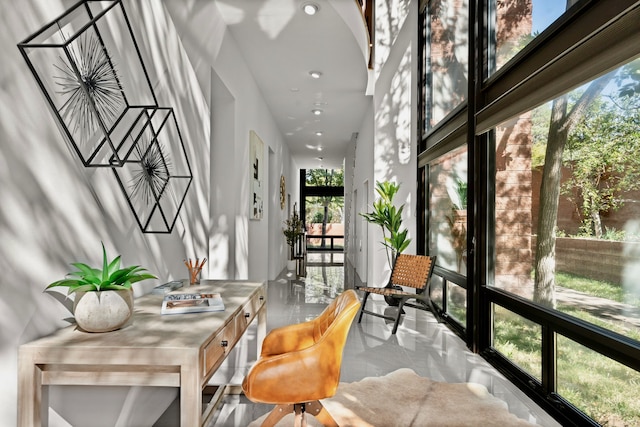 sunroom / solarium featuring a wealth of natural light