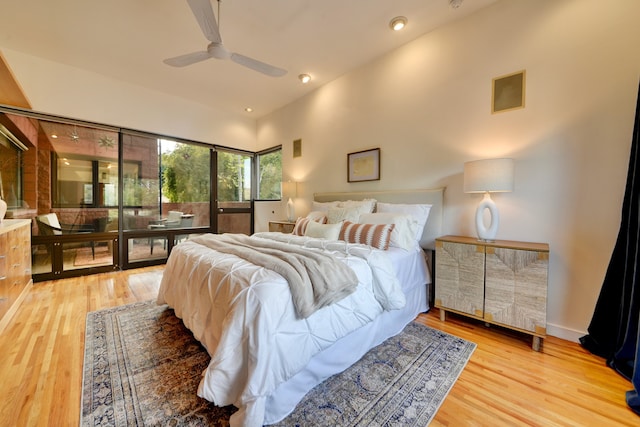 bedroom featuring hardwood / wood-style flooring and ceiling fan