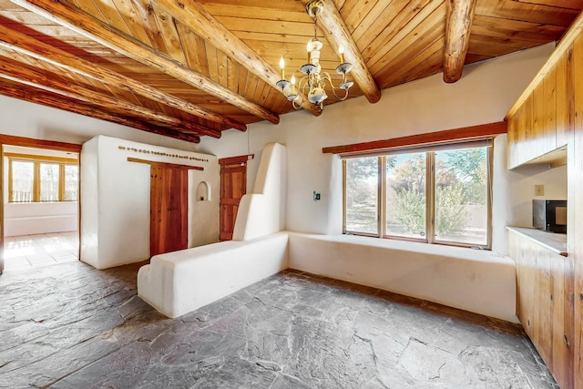 additional living space featuring wooden ceiling, beam ceiling, and a notable chandelier