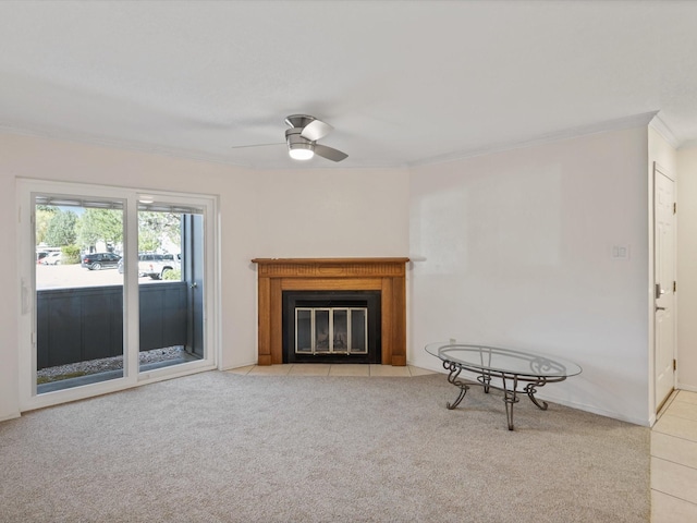505 Oppenheimer Dr Unit 511, Los Alamos, NM 87544 - unfurnished living room with crown molding, carpet flooring, a ceiling fan, a fireplace with flush hearth, and baseboards