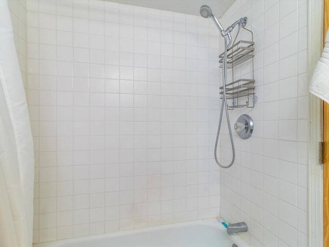 full bath featuring shower / bath combination with curtain