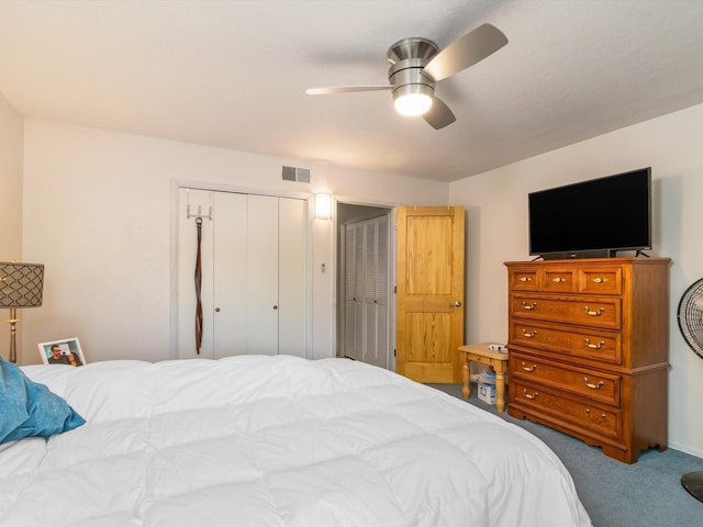 bedroom featuring visible vents, ceiling fan, and carpet