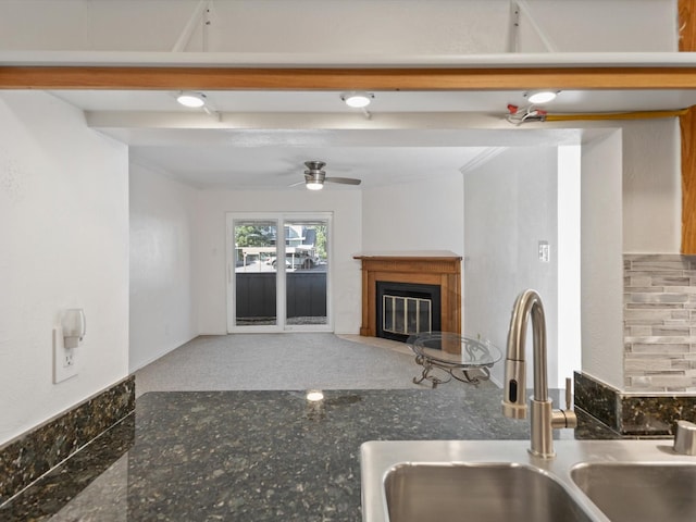 505 Oppenheimer Dr Unit 511, Los Alamos, NM 87544 - kitchen with a sink, a glass covered fireplace, and ceiling fan