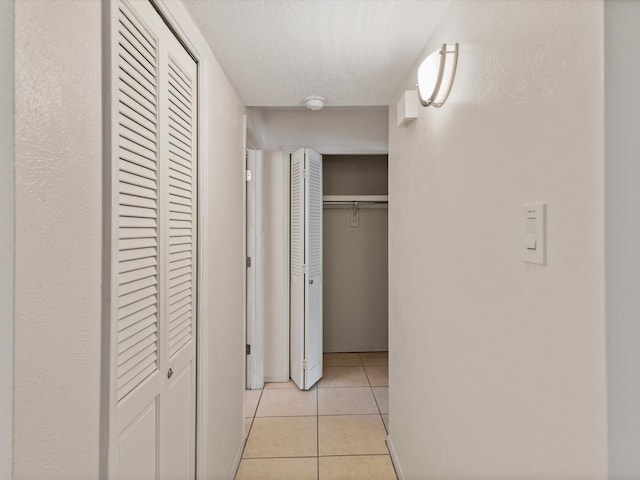505 Oppenheimer Dr Unit 511, Los Alamos, NM 87544 - hallway featuring light tile patterned floors