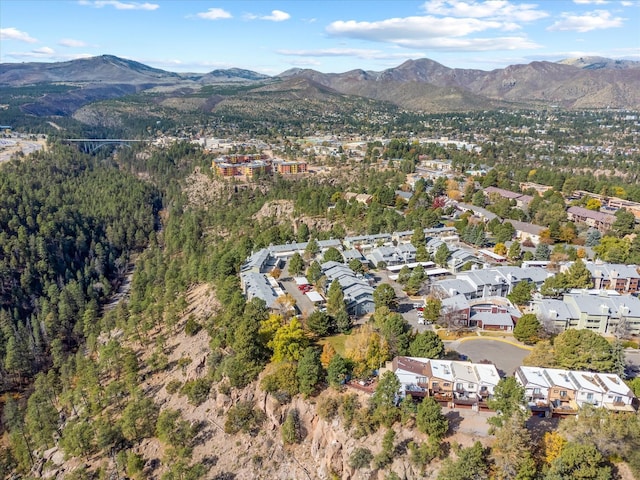 drone / aerial view featuring a residential view and a mountain view