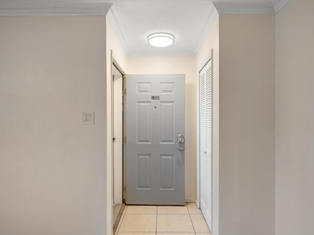 505 Oppenheimer Dr Unit 511, Los Alamos, NM 87544 - doorway with crown molding, light tile patterned floors, and baseboards