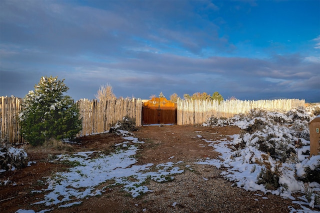 view of yard covered in snow