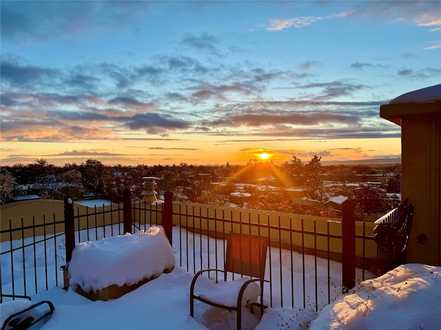 view of snow covered deck