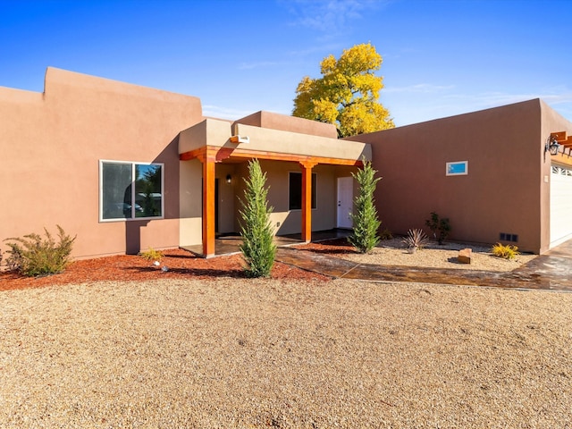 adobe home with a garage