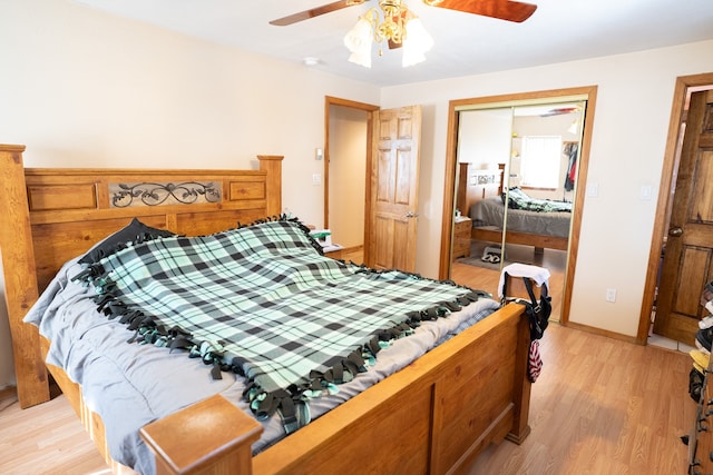 bedroom featuring a closet, light wood-type flooring, and ceiling fan