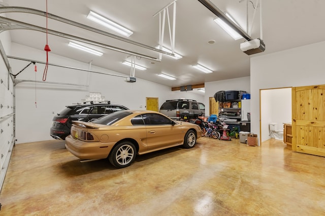 garage featuring a garage door opener