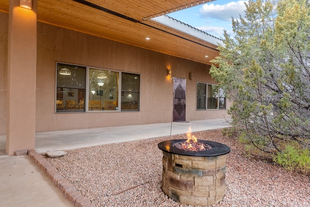 doorway to property with a patio