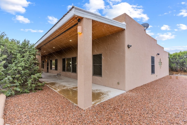 rear view of property with a patio area