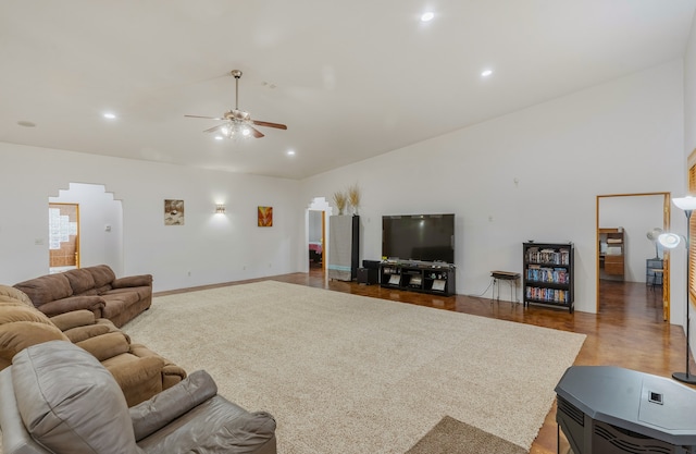 living room with hardwood / wood-style flooring and ceiling fan