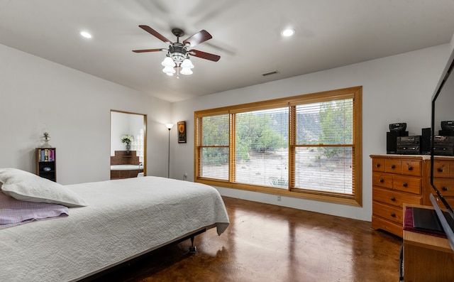 bedroom with ensuite bathroom and ceiling fan