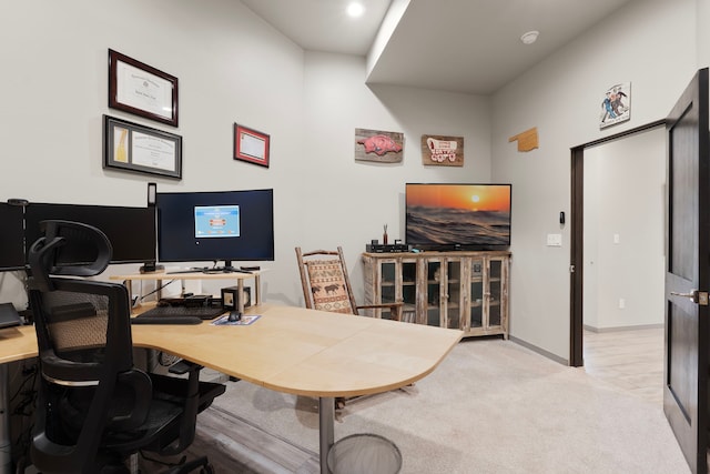 office area with light colored carpet