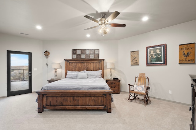 carpeted bedroom with ceiling fan and access to outside