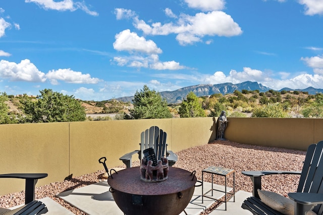 view of patio featuring a mountain view