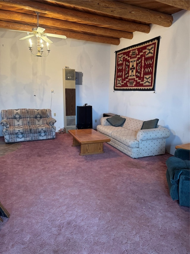 carpeted living room with ceiling fan and beamed ceiling