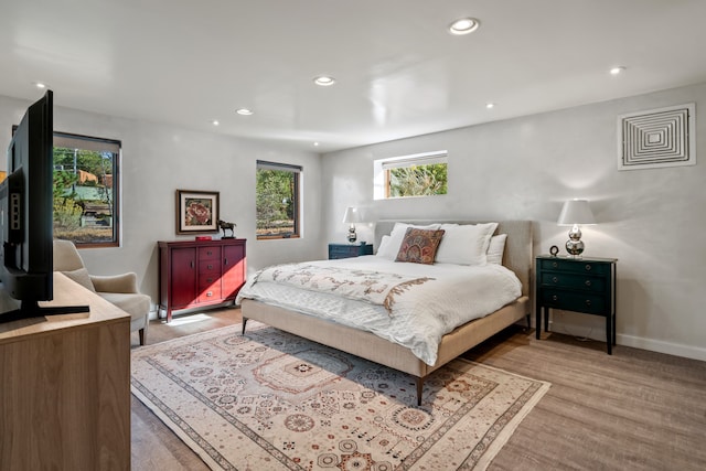 bedroom featuring light hardwood / wood-style floors