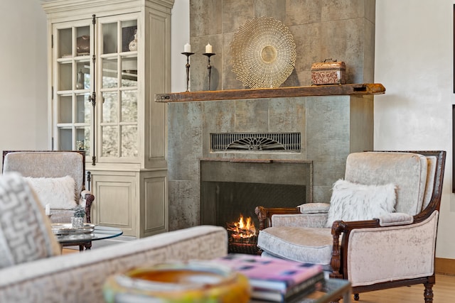 sitting room featuring hardwood / wood-style floors