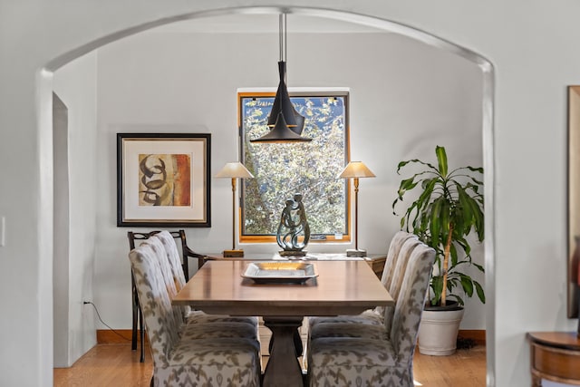 dining space featuring light hardwood / wood-style flooring