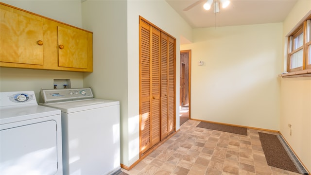 laundry area with cabinets, washing machine and dryer, and ceiling fan