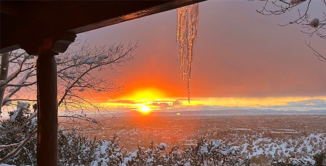 snowy landscape featuring a mountain view