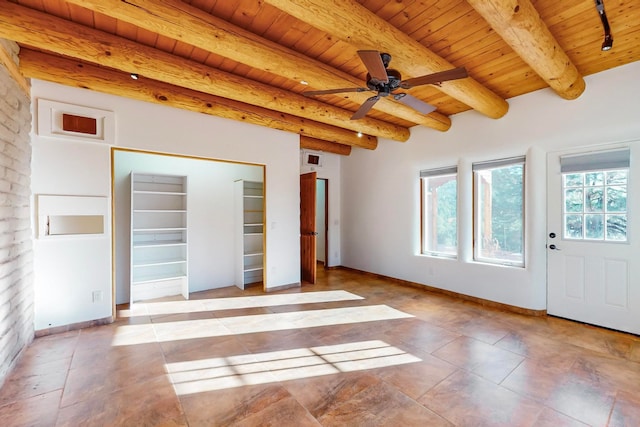 tiled empty room with ceiling fan, beamed ceiling, and wood ceiling