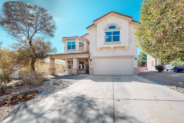 view of front of home with a garage