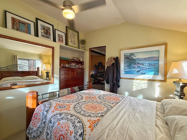 bedroom with ceiling fan and vaulted ceiling