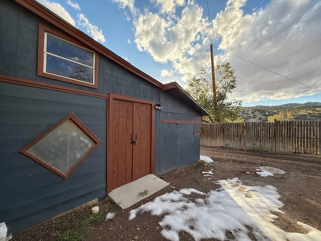 view of outbuilding with a mountain view