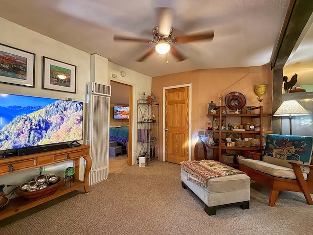 carpeted living room featuring ceiling fan