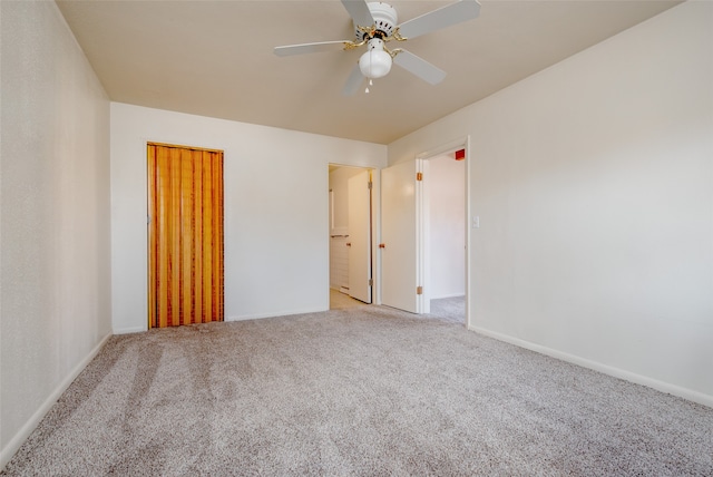 empty room with light carpet and ceiling fan