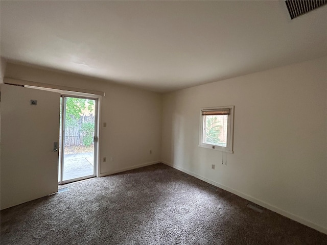 spare room with plenty of natural light