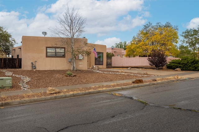 view of pueblo revival-style home