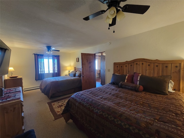 bedroom featuring baseboard heating, ceiling fan, light colored carpet, and a textured ceiling