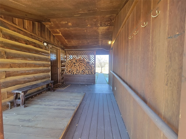 hallway with wooden ceiling, wood-type flooring, and vaulted ceiling