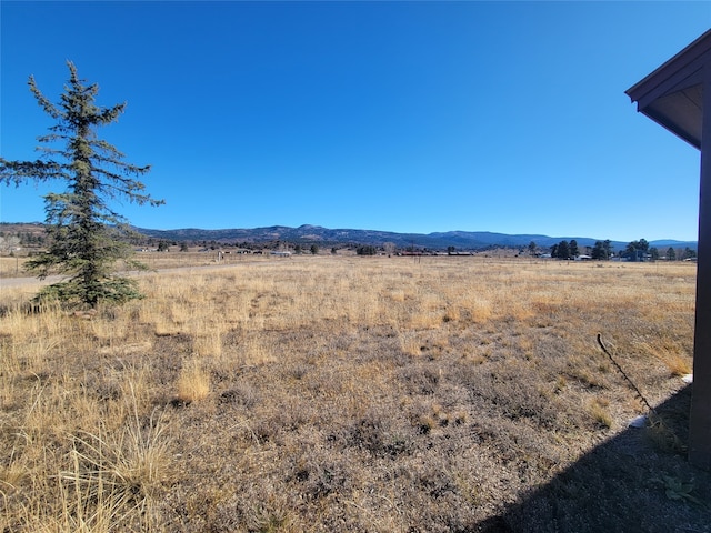 view of mountain feature featuring a rural view